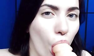 Low-spirited teen with juicy ass is playing with big dildo on webcam