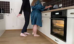 Horny mother-in-law and son-in-law masturbate together in the kitchen