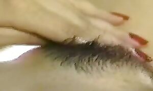 Incomparable Asian Girl Plays with Her Hairy Pussy upstairs the Edging